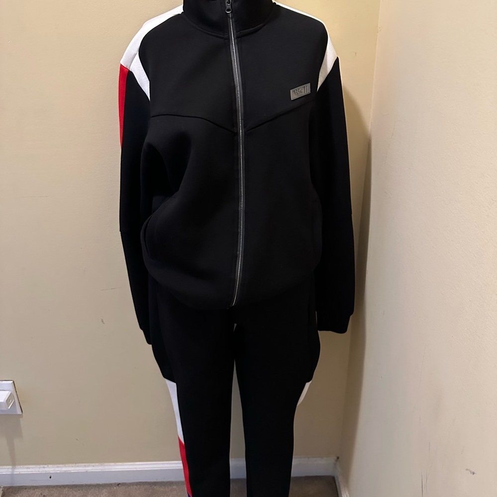 Black Track Suit with Red and White Accents